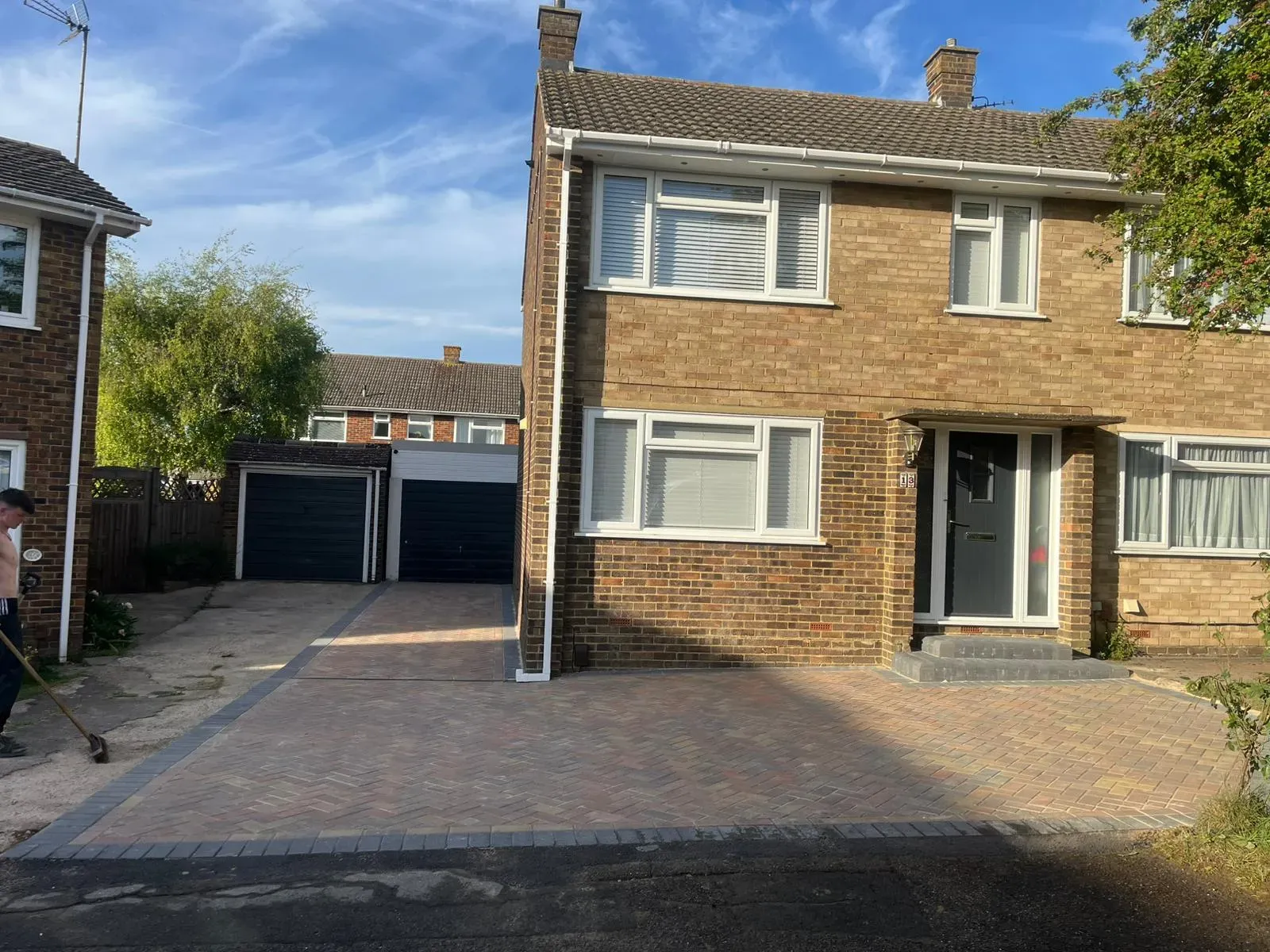 Expertly finished block paving driveway with herringbone design by Top Pave Driveways LTD